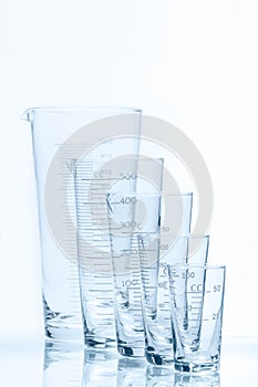 Set of five empty temperature resistant conical beakers of different size