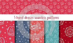 Set of five hand drawn seamless patterns with christmas tree, toys, snowflakes, glass snowball. New Year and Christmas doodle