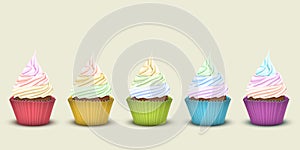 Set of five rainbow cupcakes