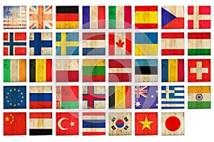 Set, flags of different countries on wooden blocks. Isolated on white background. Signs and symbols