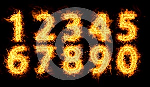 Set of flaming numbers on black background