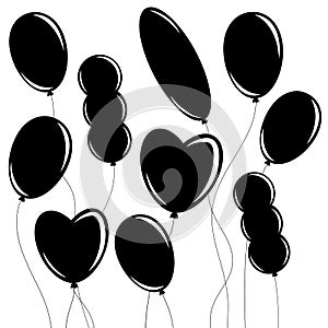 A set of flat black isolated silhouettes of balloons of different shapes on white . Simple flat vector illustration. Suitable for