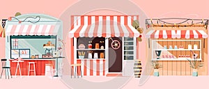 A set of flat hand drawn illustrations depicting a wooden market stall with a red and white striped awning isolated in a