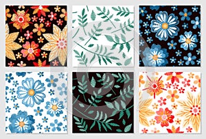 Set of floral seamless patterns. Embroidery of flowers and leaves on white and black background.