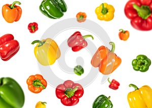 Set with flying colorful sweet peppers isolated on a white background. Falling bell pepper. Vegetable pattern