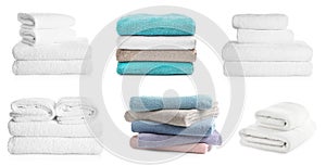 Set of folded colorful towels on white background. Banner design