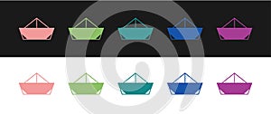 Set Folded paper boat icon isolated on black and white background. Origami paper ship. Vector