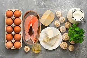 Set of foods rich in vitamin D on a gray background. The concept of healthy diet food. Top view, flat lay