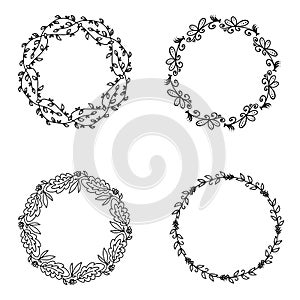 A set of four beautiful frames of wreaths with place for text.