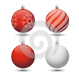 Set of four christmas balls on a white background with shadows.