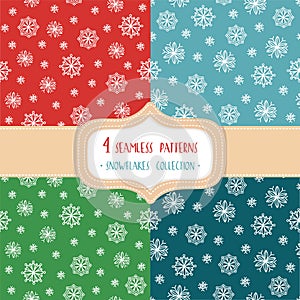 Set of four Christmas seamless vector patterns with snowflakes.