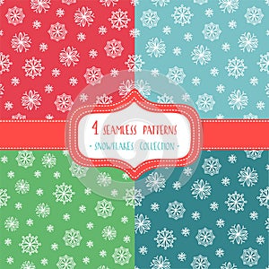 Set of four Christmas seamless vector patterns with snowflakes.
