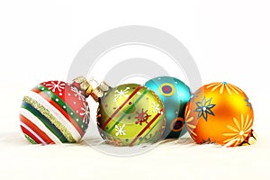 Set of four colorful Christmas balls on white background