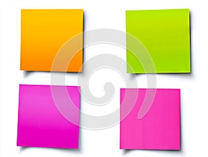 A set of four different colored sticky notes on a white background