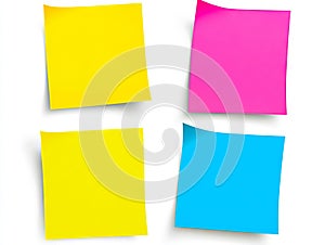 A set of four different colored sticky notes on a white background