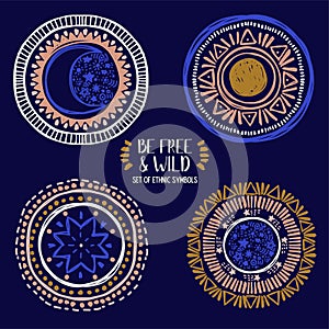 Set of four ethnic style symbols, moon, sun and stars