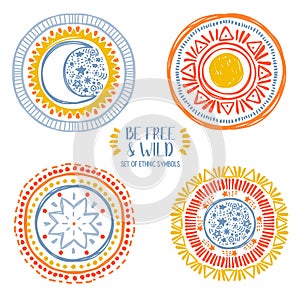 Set of four ethnic style symbols, moon, sun and stars