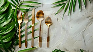 Set of Four Gold Colored Forks and Spoons