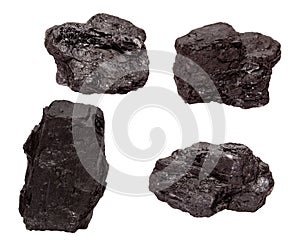Set of four piece of coal isolated on a white