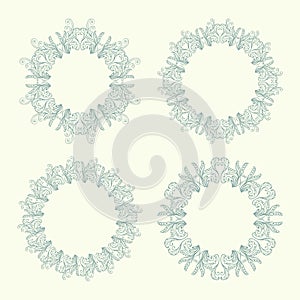 Set of four round floral ornamental frames. Vintage circular pattern.