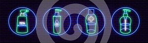 A set of four round neon icons, antiseptics or antibacterial agents. Against a brick wall.