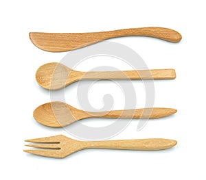 Set of four spoon fork and knife wooden textured equipment. Isolated on white background. cutlery handmade wood material prepare f
