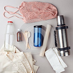 Set for free plastic shopping and packaging - cotton bags and glass gar, paper, steelness bottle. Zero waste modern trendy concept