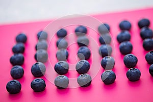 Set fresh blueberry isolated on pink background