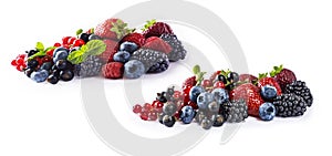 Set of fresh fruits and berries isolated a white background. Ripe blueberries, blackberries, currants, raspberries and strawberrie