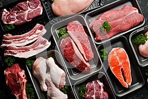 Set of fresh raw meat and fish in plastic boxes: veal, salmon steak, chicken, pork. Banner for the supermarket.