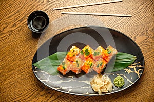 A set of fresh sushi rolls with salmon