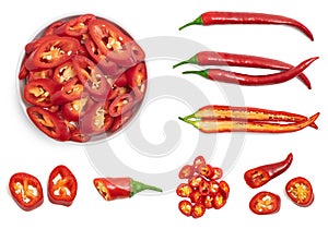 Set of fresh whole and sliced red chili pepper isolated on white background. Top view
