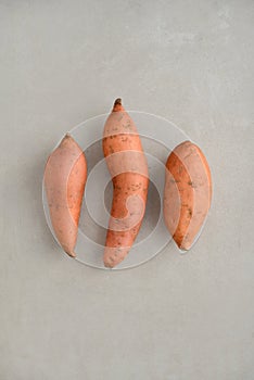 Set of fresh whole sweet potatoes