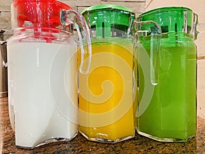 Set of fruit smoothies fruits orange juice drink straw in a cup .