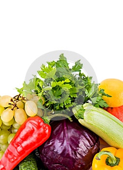 Set of fruits and vegetables isolated on white . Free space for text. Vertical photo