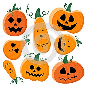 A set of fun and horrible orange pumpkins isolated on white