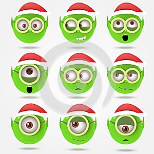 Set of funny green Santa's elfs smiles in goggle glasses