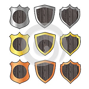 Set of game bronze, silver, gold shields, cartoon medieval armor of metal and wood decorated. Knight ammo, iron or