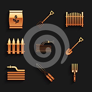 Set Garden hose or fire hose, Gardening handmade scissor, fork, shovel, fence, and Fertilizer bag icon. Vector