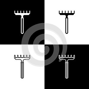 Set Garden rake icon isolated on black and white background. Tool for horticulture, agriculture, farming. Ground