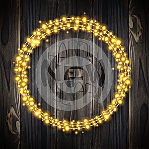 Set of garland lights. Glowing round christmas lights on wooden background. Includes vector brushes festive strands of