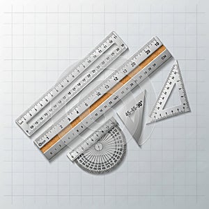 Protractor, a wooden ruler, and two set squares (45-45-90 and