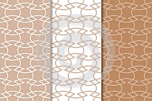 Set of geometric ornaments. Brown and white seamless patterns