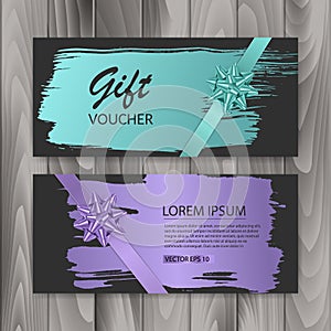 Set of gift cards, with dark background, decorated with a realistic bow and brush stroke. Vector eps 10