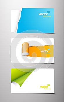 Set of gift cards with rolled teared corners.