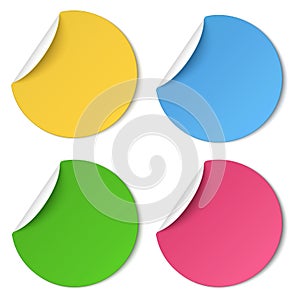 Set of glaring color round paper stickers with edge curl isolated on white background