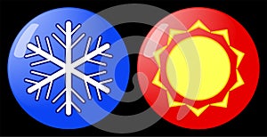 Set of glass buttons with sun and snowflakes emblem.