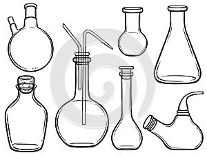 Set of glass laboratory dishes for chemical experiments. photo