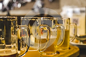 set of glasses with different types of beer