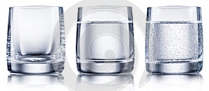 Set of glasses - empty glass, glass of vodka or gin, and chilled glass with alcohol drink. File contains clipping path for each